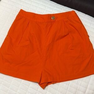 Maeve orange shorts purchased through Anthropology but sold by Nuuly.